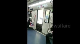 Subway train hurtles down tracks with door wide open in China