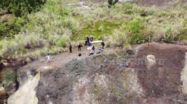 Nature explorers hike steamy mouth of active volcano in the Philippines