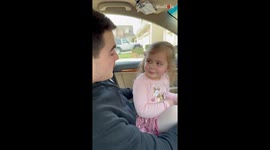 Girl pays unintentional tribute to Chandler Bing as dad teaches her how to smile