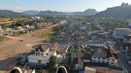 Extreme Sports, ParaMotor flight and landing, Vang Vieng, Laos.
