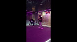 That's me and my brother playing a VR game where we need to kill zombies with guns. Its highly interactive game.