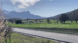 Macron and his escorts leave Savines-le-Lac, France