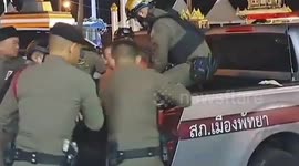 Raging tourist pinned into police truck during drunken rampage in Thailand