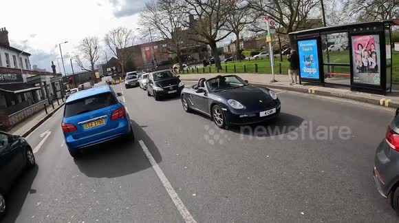 Female Driver Angry at Being Videoed On Her Phone, starts shouting
