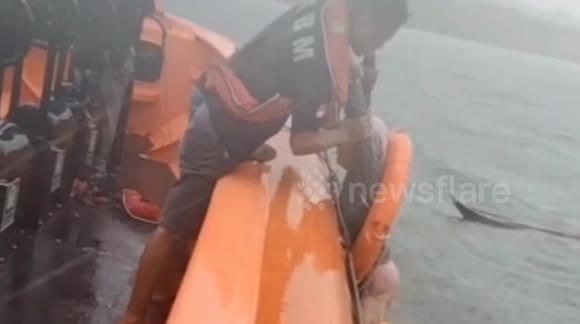 Elderly woman rescued from drowning after boat overturns in Indonesian waters