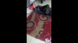 Terrifying flood in Makassar, Indonesia - sleeping guy almost drowns