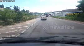 Close Call: Distracted Driver Sharply Slams Brakes After Noticing Traffic Jam