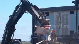 Demolition work begins at new school in Cornwall before a class has been taught after building firm's demise