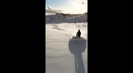 Girl's awe-striking snowmobiling adventure in Norway proves that 'riding is life'