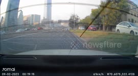 Crash: Crazy Road Incident Recorded When a Red Car Unexpectedly Flips Into The Air