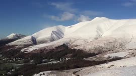 Stunning panoramic views of the snow-covered English Lake District