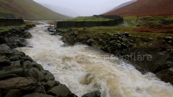 River levels rise rapidly as rain hits sodden ground in Cumbria, UK