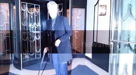 Peter Capaldi arrives at party with aid of walking stick