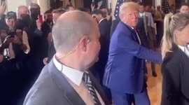 Trump walks into Mar-a-Lago residence and shakes hands with supporters after being charged with 34 felony counts