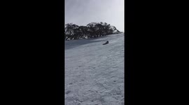 Tobogganing into an icy ditch while holidaying in Perisher Valley