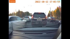 Accident: Vehicle Driving Through Narrow Lane Hits Red Car and Knocks Off Their Mirror