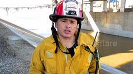 Firefighters Perform Dramatic Rescue Of Man Stranded In A River In Los Angeles, CA, USA