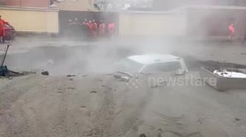4 injured after giant sinkhole filled with boiling water swallows up car with children onboard in St. Petersburg, Russia