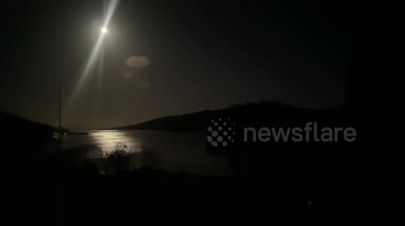 Super Pink Moon shines over Scottish coastline