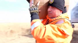 Experts Blast Frozen River Surface To Prevent Flooding In Ushakovo, Russia