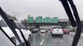 Atlanta highway traffic in rainstorm drenching Georgia on Easter weekend