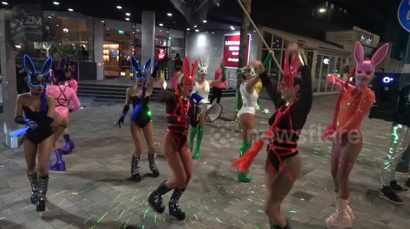 Easter bunnies dance in the street as revellers hit the town in Birmingham, England on Saturday night
