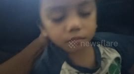 When this child is very very sleepy, so the father treats it like this