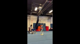 Acrobat tries to go through a ring during stunt practice *Gymnastic fail*