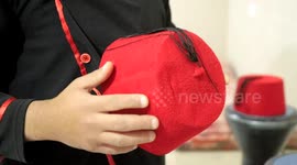 Palestinian dawn awakeners ''al-Musaharati'' walk through streets to wake up Muslims for a meal before sunrise during the fasting month of Ramadan, in Al-Shati refugee camp