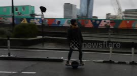 Man on monowheel vehicle near Blackfriars Underground Station