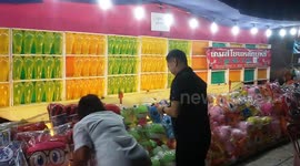 Eagle-eyed dart thrower earns second income selling stuffed toys he wins from fairs