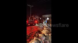 US: Residents In Salt Lake City Pile Sandbags To Prevent Flooding