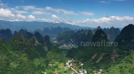 Stockshots: Drone Time-lapse Sunlit Mountain In Yangshuo, China