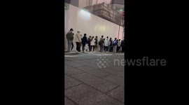 Hundreds line up overnight to get new Pokemon card game in Tokyo, Japan