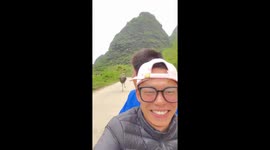 Ostrich chases two Chinese students on electric scooter after being teased