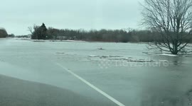 Minnesota man encounters multiple closed roads due to flooding trying to get home. Here he drive down a closed road to show you the dangers