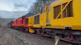 The log train which is now a regular thing travelling through Mid Wales.