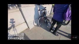 Moments after cyclists collides with a car door outside the House of Commons