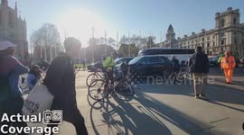 Moments after cyclists collides with a car door, (allegedly of an African diplomat) outside the House of Commons [EXTRA FOOTAGE]