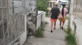 Pet owners visit their departed dog at cemetery in the Philippines