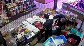 Street vendor falls unconscious after stranger applies mysterious ointment on his back in China