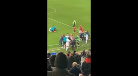 Watch 20-man brawl unfold as UK football teams clash over injured player's treatment