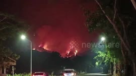Forest fire spreads across mountain in central Thailand