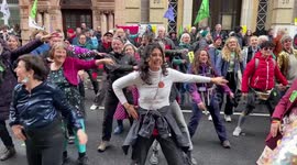 Extinction Rebellion protesters dance to tune of 'Stayin' Alive'
