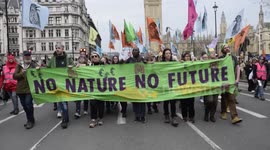 biggest rally to date , The Earth Day March XR, Fossil Free London  whitehall ,carnival of groups paraded around westminster . london uk