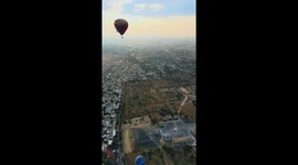 Stunning view of Hot Air Balloon Ride over Teotihuacán Pyramids, Pyramid of the Sun and Pyramid of the Moon, in Mexico after sunrise