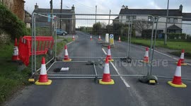 A mysterious hole appears in the road near houses, residents fear it could be an old mine shaft collapsing