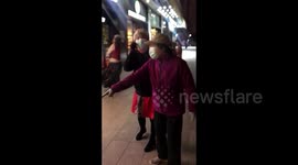 Elderly square dancers clash with young skateboarders over public space in Beijing