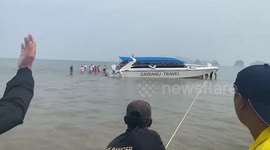 Boat carrying dozens of tourists dragged out of sandbank after being stranded in Thailand