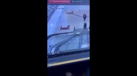 Shocking scene as man knocked unconscious after being kicked down escalator in Kazakhstan